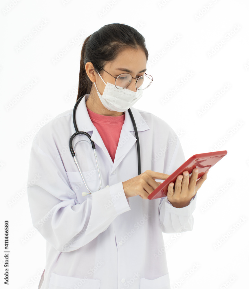 Portrait of Asian female doctor in white gown coat wearing protective hygiene mask and holding a tablet computer in hand. Isolated on white background Portrait of Asian female doctor in white gown coat wearing protective hygiene mask and holding a tablet computer in hand. Isolated on white background