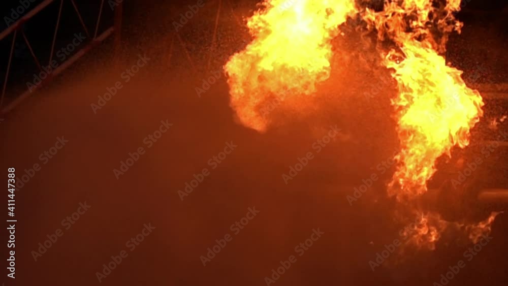 FHD Slow motion Water spraying from fireman to fight with Explode of oil pipeline leak and explosion on oil rig and natural gas station. Insurance and safety diaster concept.