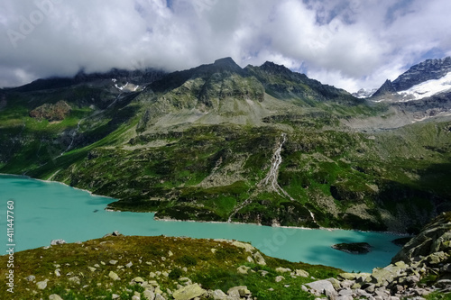 wonderful turquoise lake in the mountains view from above