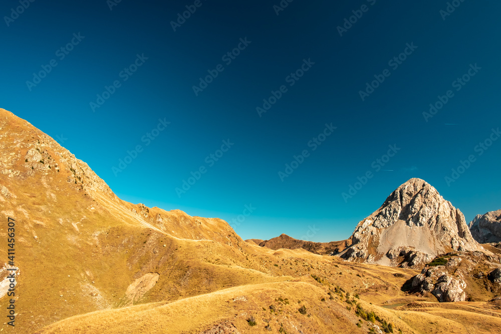 Naklejka premium The Carnic Alps in a colorful autumn day