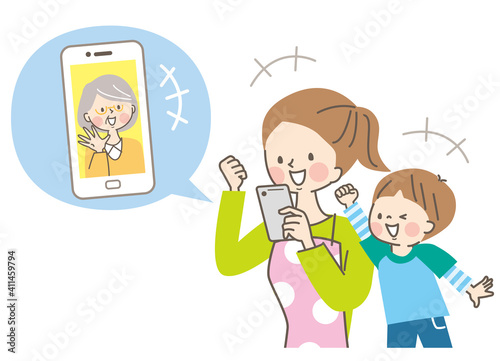 スマホでビデオ通話するシニア女性と娘と孫

