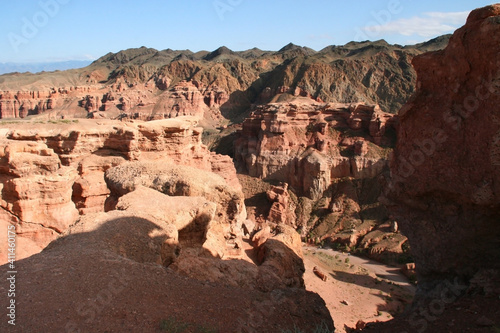 Charyn Canyon in South East Kazakhstan  summer 2019. Red rock canyon trail landscape. Trail in red rock canyon desert. Red rock canyon desert trail landscape. Yellow-red rocks of canyon in Kazakhstan.
