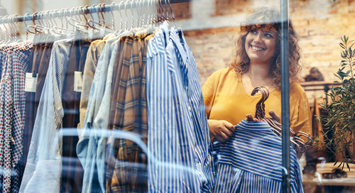 Woman working in a clothing store