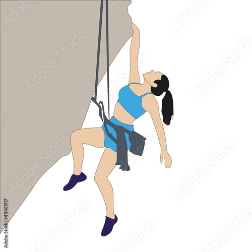 Woman hang on rock cliff, extreme solo cimbing photo