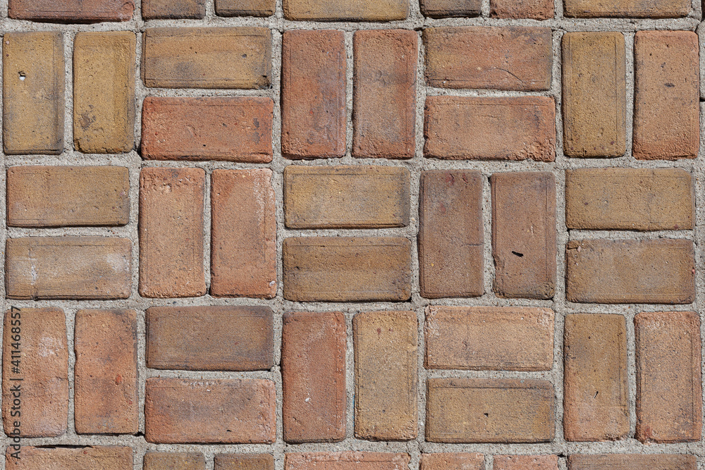 Obraz premium Brick wall background with bricks in a square shape pattern, copy space