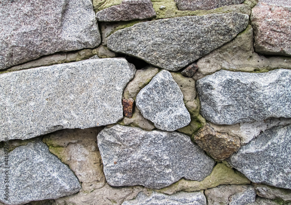 Cemented stones in concrete. Photo of a historic building. Cemented stones in concrete. Photo of a historic building.