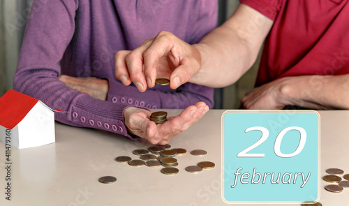 February 20, 20th day of month. Reminder to plan family budget together for woman and man. Winter month .Day of the year concept.