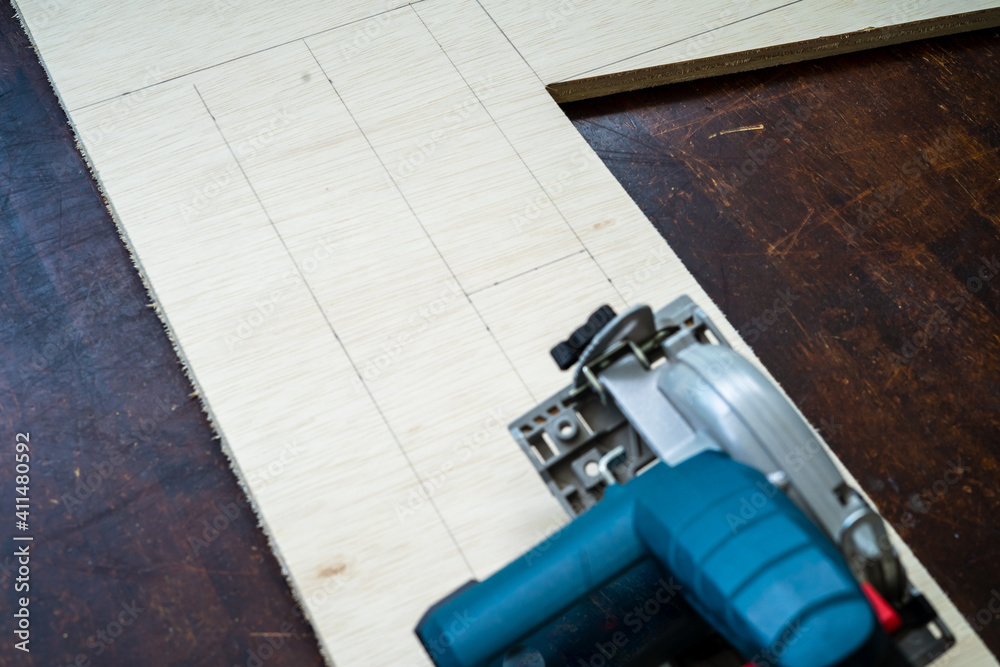 Wood working. Fine quality hardwood lumber, ready for use. electric circular saw on lumber. Wood working. Fine quality hardwood lumber, ready for use. electric circular saw on lumber.