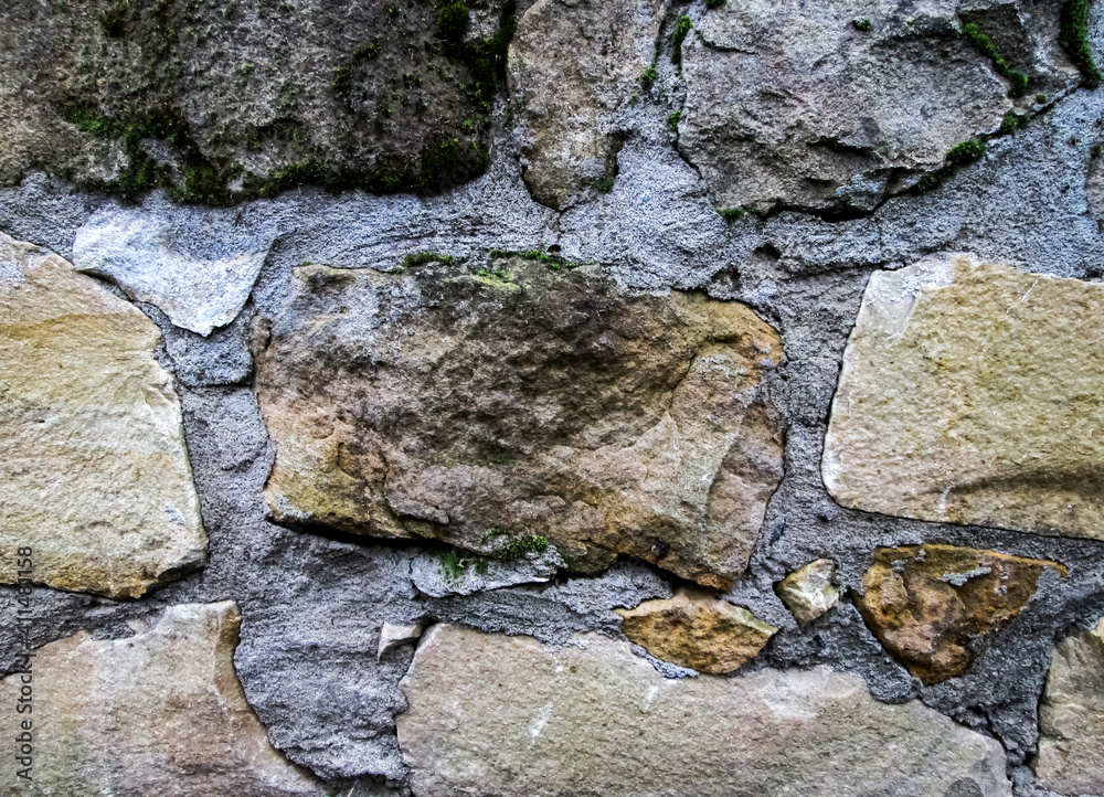 Cave stone laying. The old wall is light with brown mineral. Cave stone laying. The old wall is light with brown mineral.
