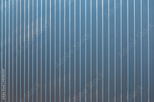 Large empty metal striped wall