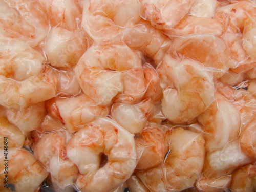 Frozen king prawns in a vacuum bag close up.