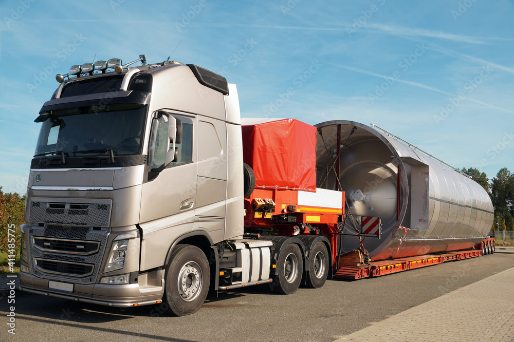 Oversize load, long vehicle or exceptional convoy. A truck with a special semi-trailer for transporting oversized loads.