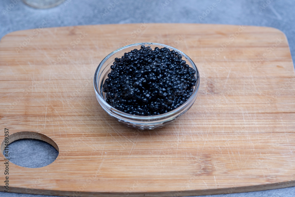 black and red caviar in the caviar bowl black and red caviar in the caviar bowl
