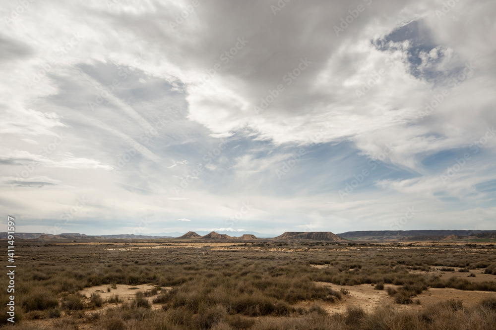 Scenic desert  landscape with dry ground and blue sky in Spain