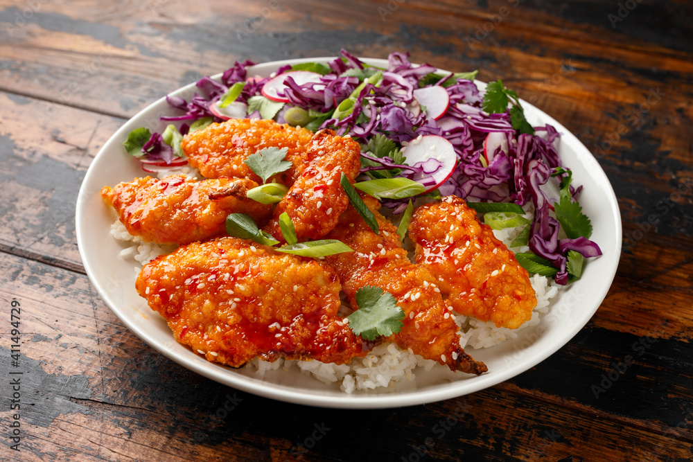 Korean Fried chicken with red cabbage salad and white rice. Asian food Korean Fried chicken with red cabbage salad and white rice. Asian food