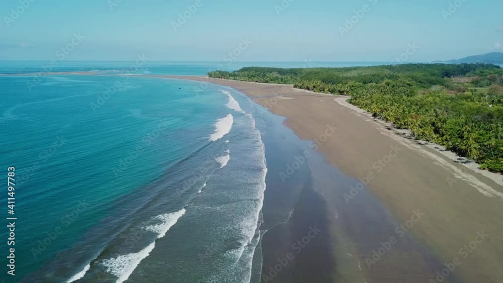 Aerial Drone Video of the Whale's Tail at the Marino Ballena National Park in Uvita, Costa Rica. Beach is in the shape of a whale tail Aerial Drone Video of the Whale's Tail at the Marino Ballena National Park in Uvita, Costa Rica. Beach is in the shape of a whale tail