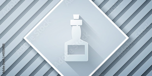 Paper cut Tabasco sauce icon isolated on grey background. Chili cayenne spicy pepper sauce. Paper art style. Vector.