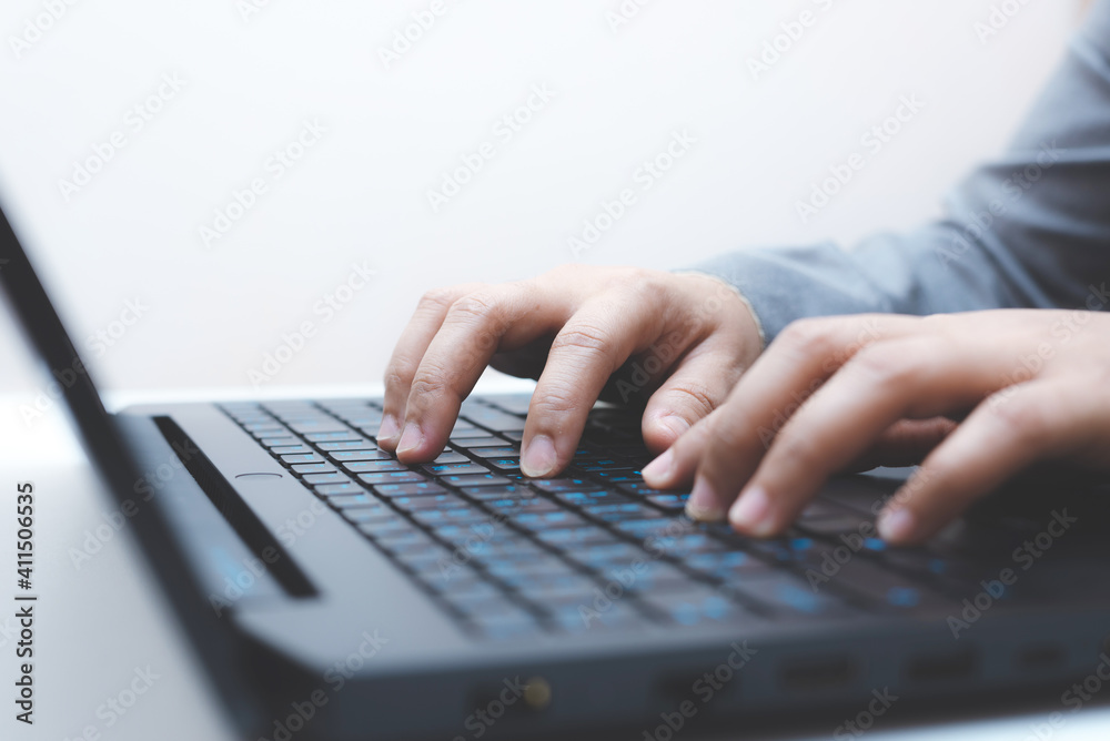 close-up of business woman hand typing and using laptop keyboard for searching with technology networking on working and job on desk at work place or work at home. close-up of business woman hand typing and using laptop keyboard for searching with technology networking on working and job on desk at work place or work at home.