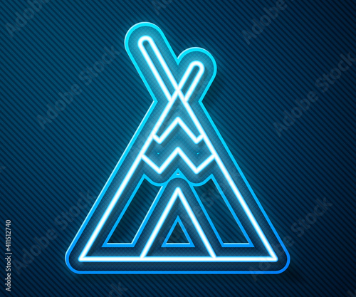 Glowing neon line Traditional indian teepee or wigwam icon isolated on blue background. Indian tent. Vector.