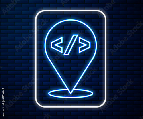 Glowing neon line Web design and front end development icon isolated on brick wall background. Vector.