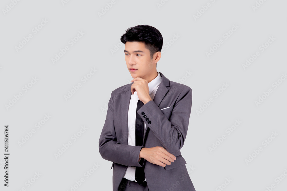 Portrait young asian business man in suit with smart thinking idea isolated on white background, businessman standing and planning for success, handsome manager or executive, emotion and expression. Portrait young asian business man in suit with smart thinking idea isolated on white background, businessman standing and planning for success, handsome manager or executive, emotion and expression.