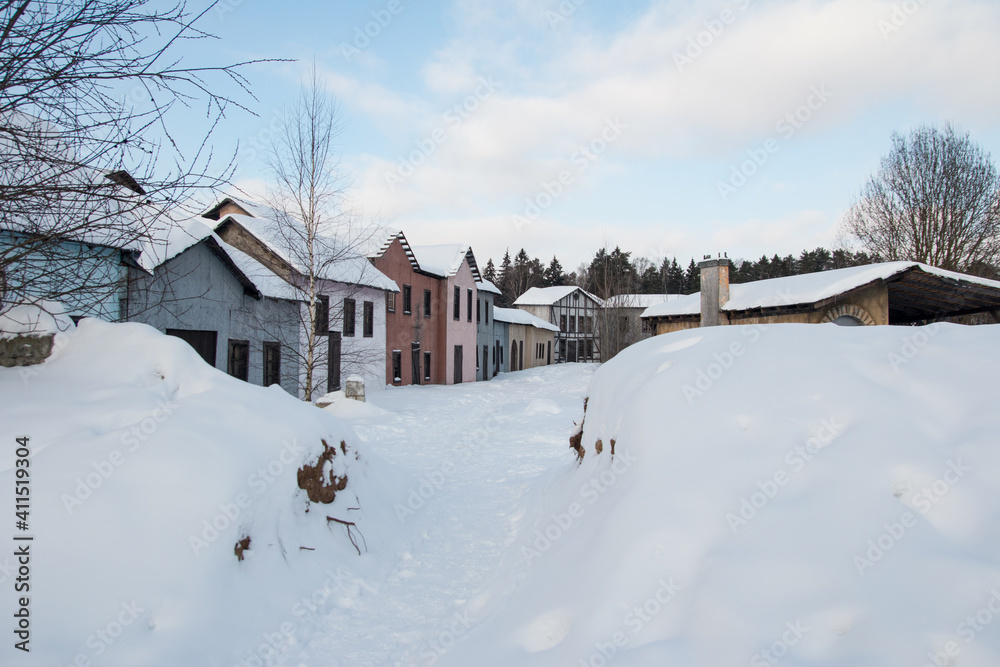 an old abandoned town. Old ruined houses winter snow covered nature winter