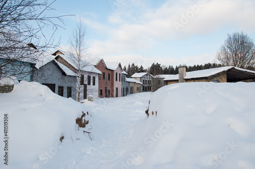 an old abandoned town. Old ruined houses winter snow covered nature winter © Светлана Высокос