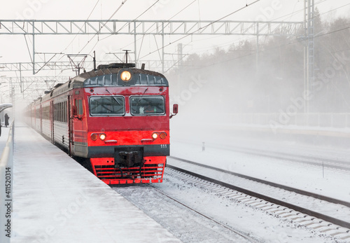 moving train train on the railway tracks. Winter