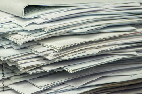 pile of paper documents in the office