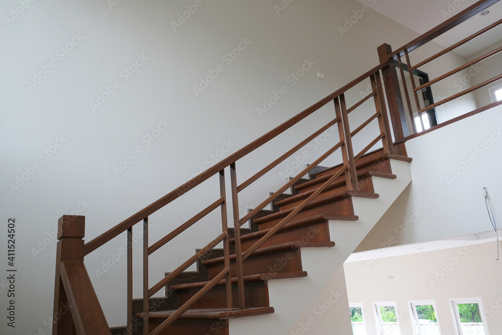 beauty wooden stair in new house . oak color iron Handrail decor interior estate. beauty wooden stair in new house . oak color iron Handrail decor interior estate.