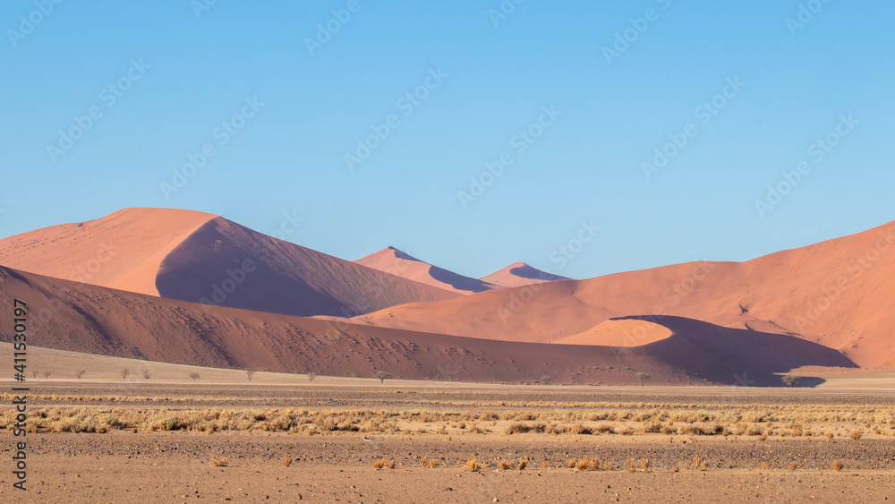 Red dunes of Namib Desert near Sossusvlei, Namib-Naukluft National Park, Namibia, Africa. Red dunes of Namib Desert near Sossusvlei, Namib-Naukluft National Park, Namibia, Africa.