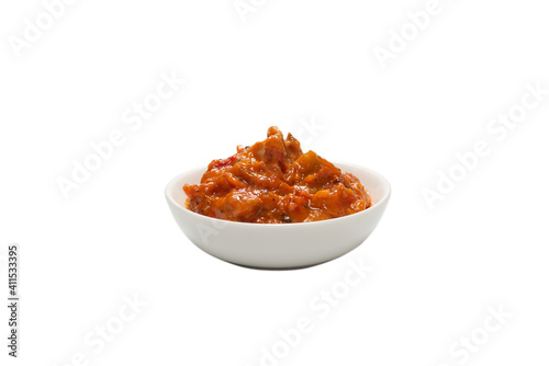 Vegetable stew in a bowl isolated on white background.