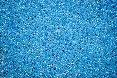 Shiny blue beads close up