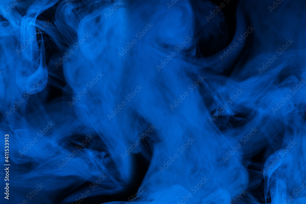 Blue steam on a black background. Blue steam on a black background.