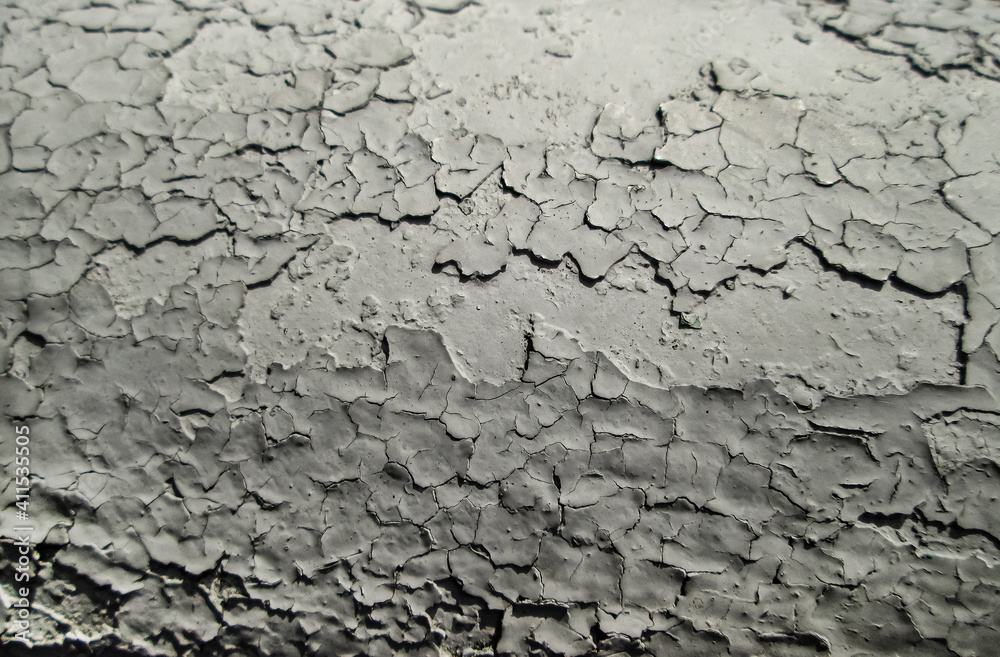 Layers of old, hardened paint. Peeled white surface. Retro effect of artistic whitewash. Layers of old, hardened paint. Peeled white surface. Retro effect of artistic whitewash.