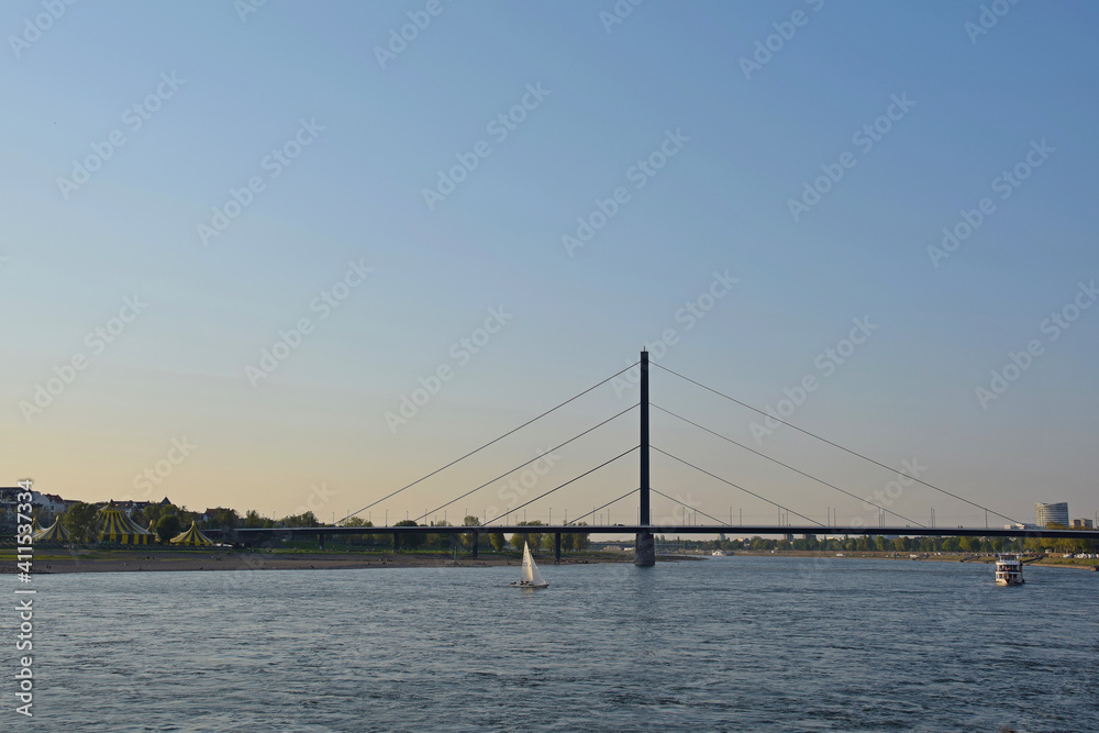 Cityscape with river view with bridge and circus