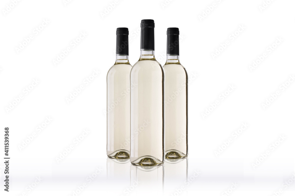 Three bottles of white wine on white background