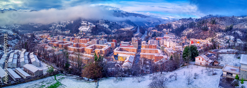 Aerial view of the town of Blimea under a snowfall. photo