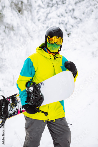 man snowboarder in ski equipment
