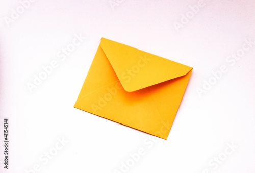 Yellow envelope on white background 