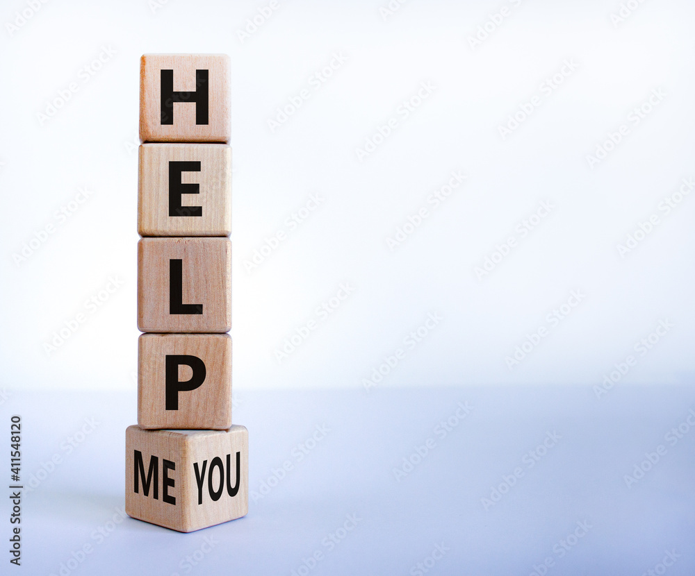 Help you or me symbol. Turned wooden cubes and changed words help me to help you. Beautiful white background, copy space. Business, motivational and help you or me concept. Help you or me symbol. Turned wooden cubes and changed words help me to help you. Beautiful white background, copy space. Business, motivational and help you or me concept.