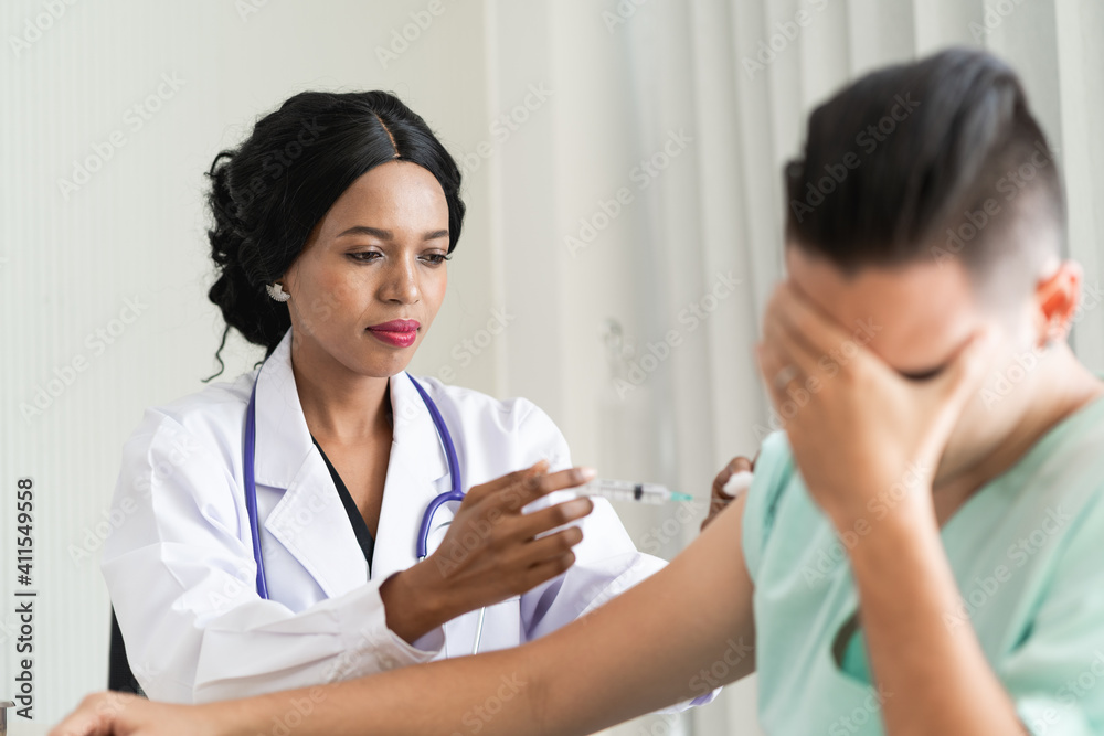 The doctor is vaccinating against the corona virus. To prevent the outbreak of the corona virus The doctor is vaccinating against the corona virus. To prevent the outbreak of the corona virus