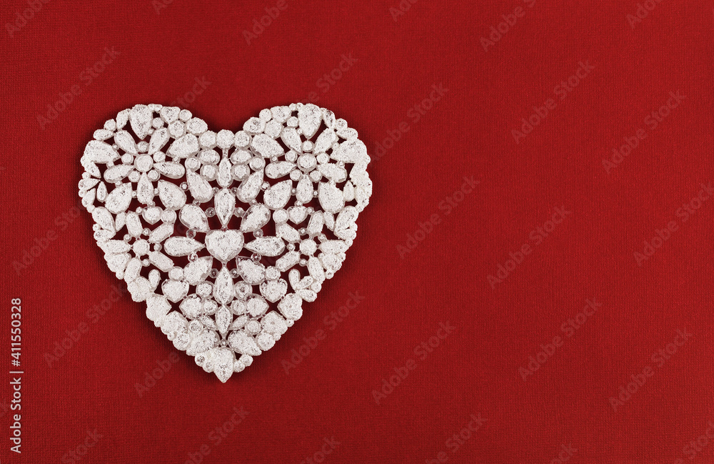 Beautiful white heart on red textured paper Beautiful white heart on red textured paper