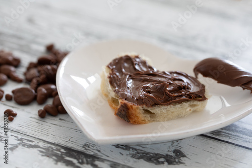 bread with chocolate in heart shape. heart shaped cake. chocolate food