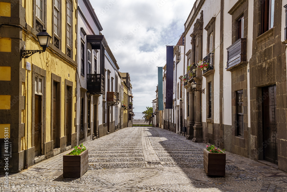 street with old, picturesque and charming houses in bright colors in the city of Las Palmas de Gran Canaria. Canary Islands. Spain.
