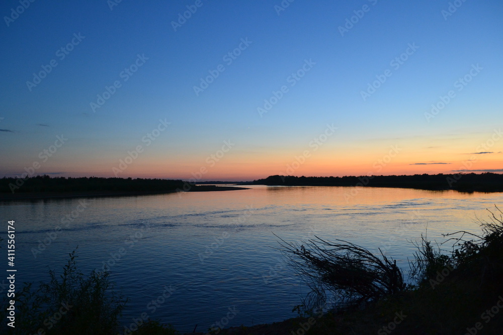 sunset over the river sunset over the river