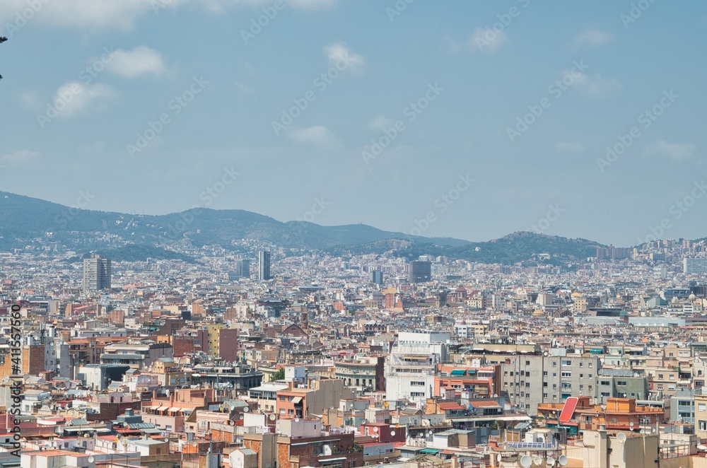Panoramic view of Barcelona cityscape from the top of the mountain in Barcelona,SPain Panoramic view of Barcelona cityscape from the top of the mountain in Barcelona,SPain