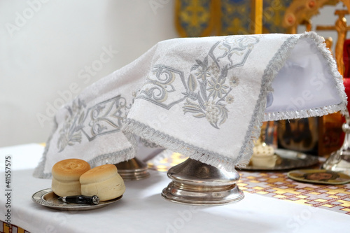 On the altar of the Orthodox Church is laid the liturgical liturgical bread 