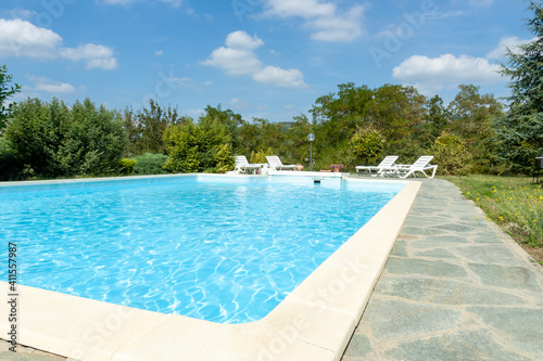 Swimming pool in italian home garden