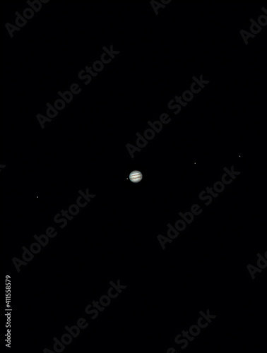 Planet Jupiter as seen from an advanced amateur telescope from a city sky at Santiago de Chile. Jupiter, the Giant Gas Planet show us its belts and spots like the great red spot, an awe night view
